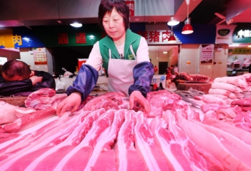 Combate à peste suína africana impulsiona indústria chinesa de carne